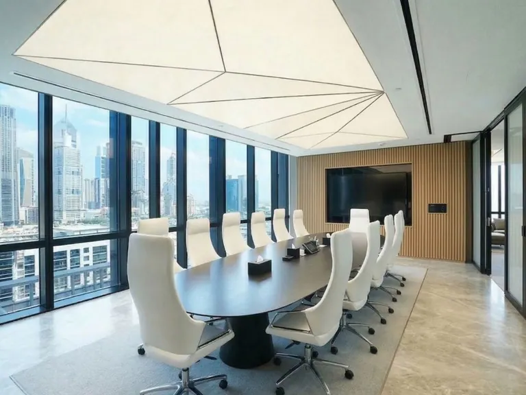 Boardroom with oval conference table and city views