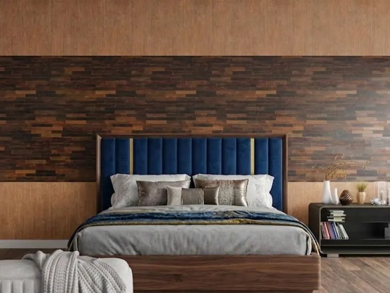 Wood veneer and timber brick wall behind a navy upholstered bed